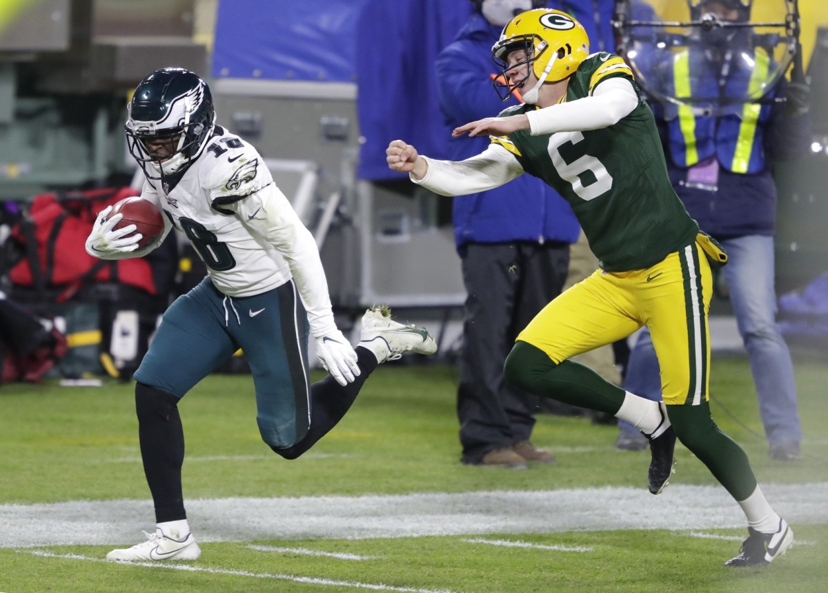 Jalen Reagor returns a punt 73 yards for a touchdown against the Packers on Dec. 6, 2020